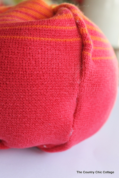 DIY Sweater Pumpkins red fabric around stuffing
