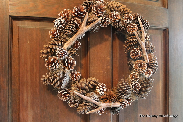faux antler wreath from the pottery barn wreath with faux antlers hanging on door