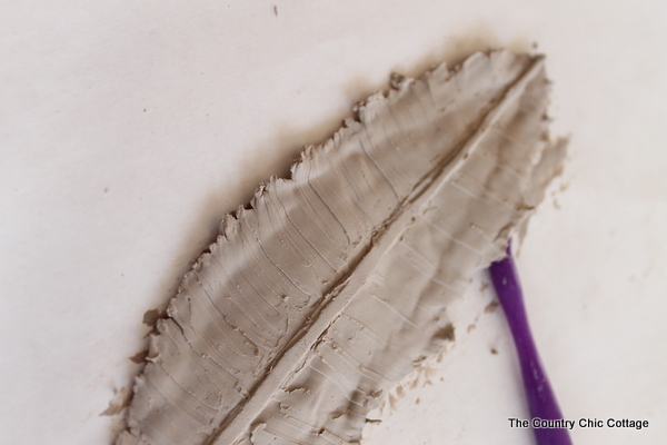 shaping clay feather
