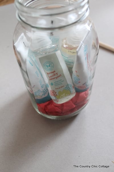 adding product samples to mason jar
