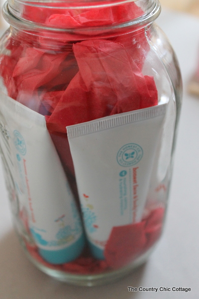 tissue paper as eco-friendly gift wrapping in a mason jar