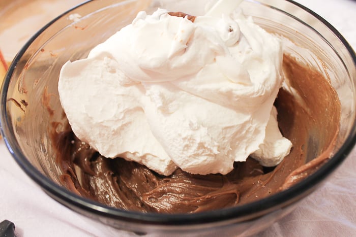 Folding whipped topping into Nutella mixture