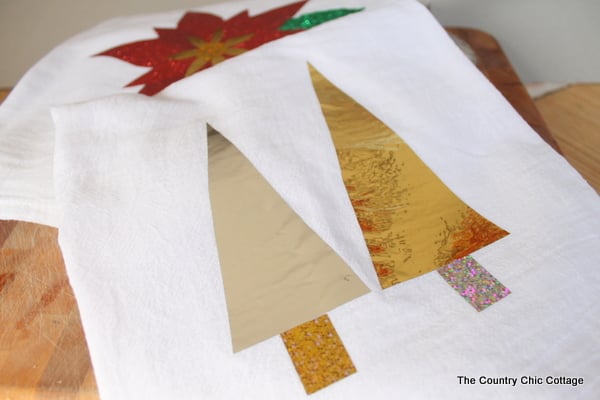 foil christmas trees on tea towel