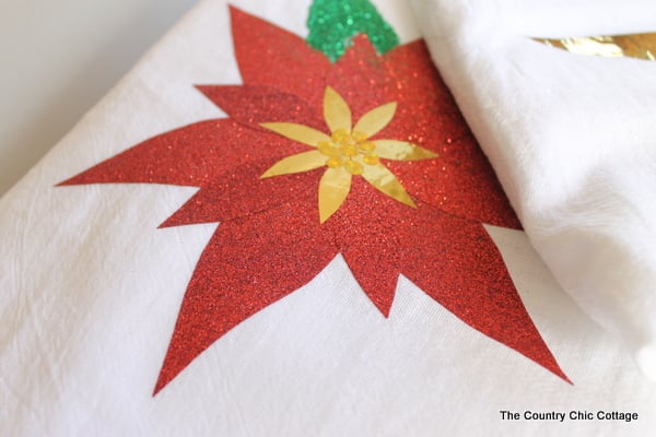 adhering poinsettia petals to tea towel