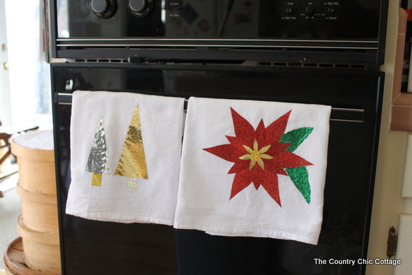 christmas tea towels hanging on stove
