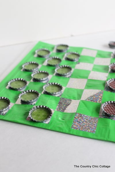 DIY Travel Bottle Cap Checkers how to make your own DIY Travel Bottle Cap Checkers