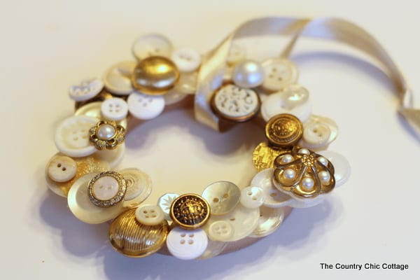 button wreath ornament button wreath ornament with white ribbon