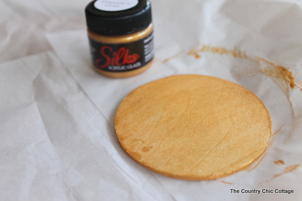 painted wooden circle ornament