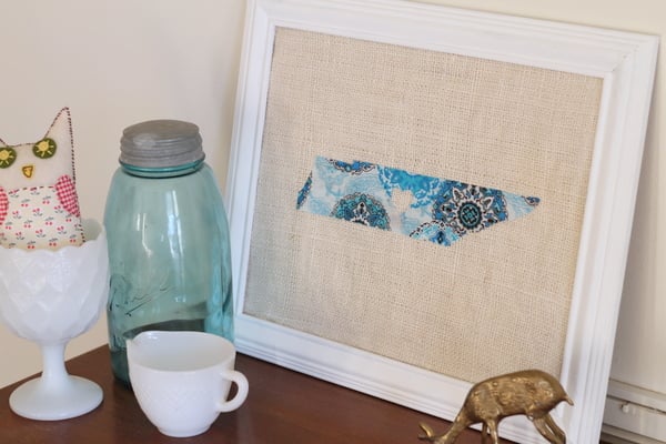 completed DIY fabric art in frame