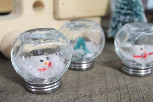 3 tiny waterless snow globes