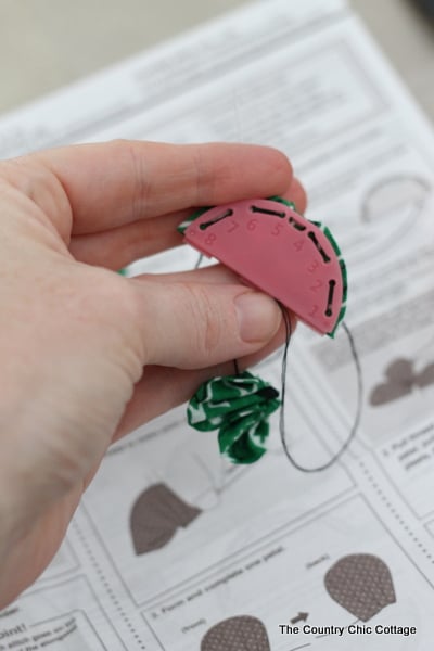 Green Kanzashi Flower Pin for Saint Patrick's Day sewing into a kanzashi