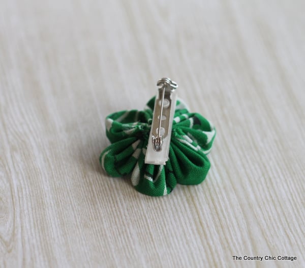 Green Kanzashi Flower Pin for Saint Patrick's Day gluing bar pin onto fabric