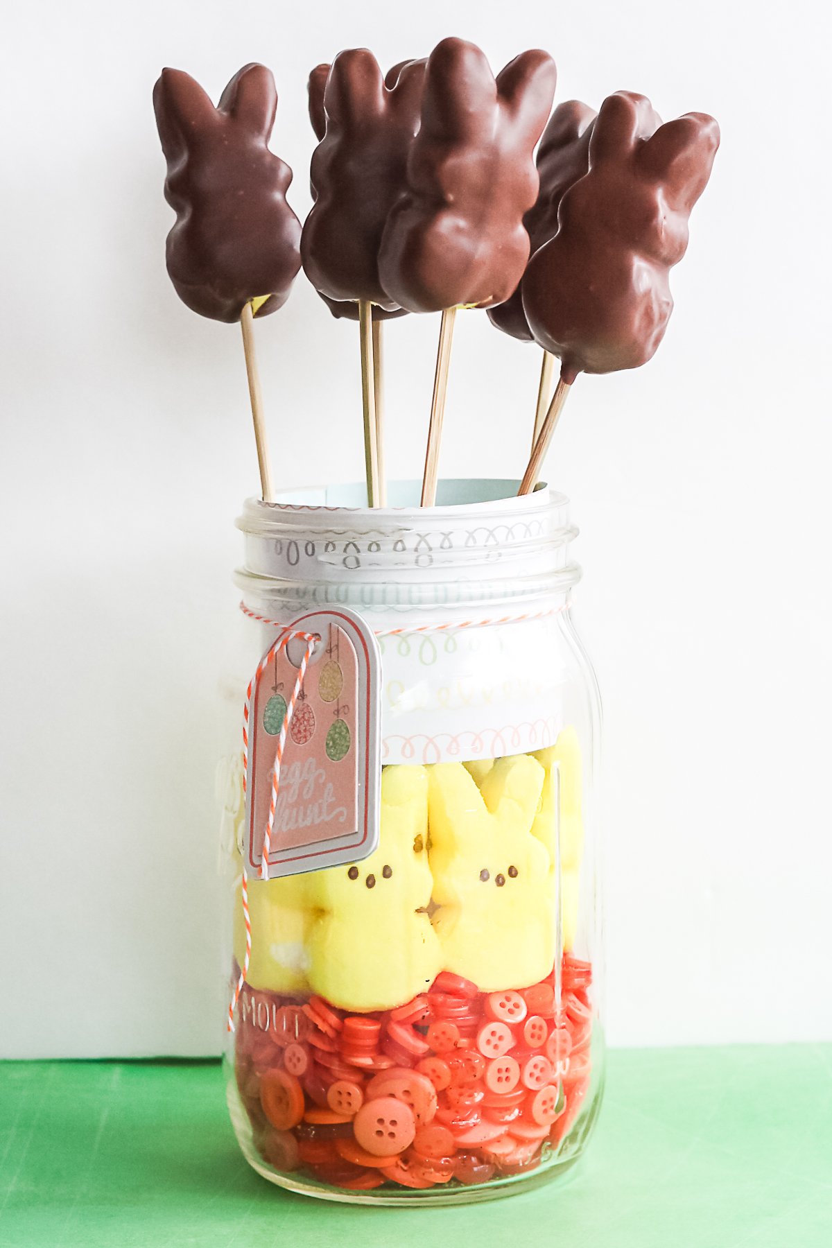 mason jar holding chocolate-covered peeps