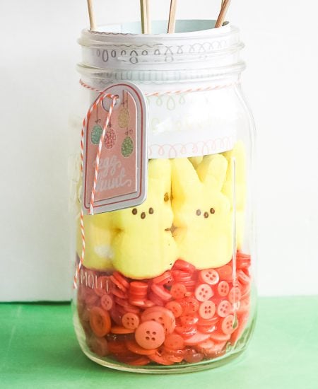 peeps and buttons in a glass jar