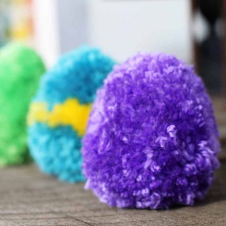 Purple, blue, and green pom pom eggs.