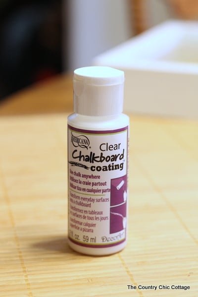Chalkboard or Permanent Herb Garden Markers that kids can easily make for mom! bottle of clear chalkboard coating