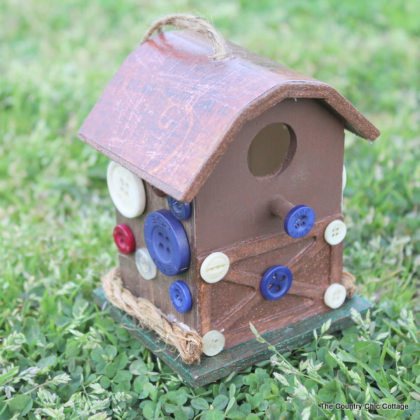 Barn Shaped Birdhouse decorated with buttons from The Country Chic Cottage