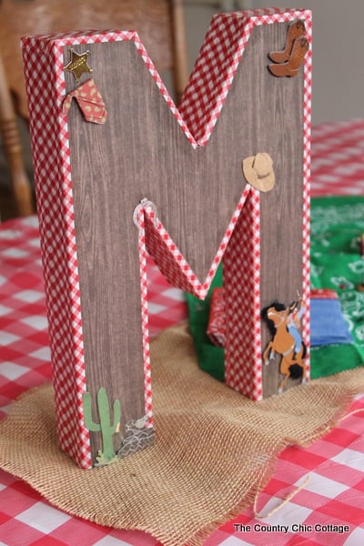 Cowboy Birthday Party Decorations and Ideas This monogramed M is the perfect addition to a cowboy themed birthday