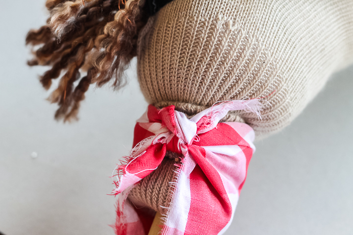 adding a bandanna to a stick horse