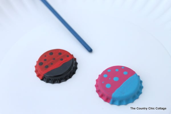 adding dots to bottle caps