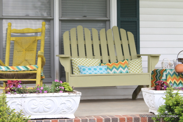 A colorful front porch transformation with a great solar powered fountain -- a must see!