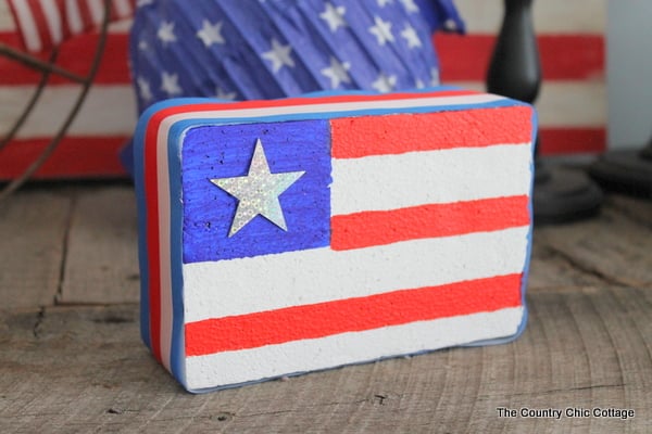 Make an American flag from foam for your patriotic decor this summer. A super simple project that only takes minutes to complete. foam american flag
