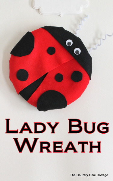 A lady bug shaped wreath pin image