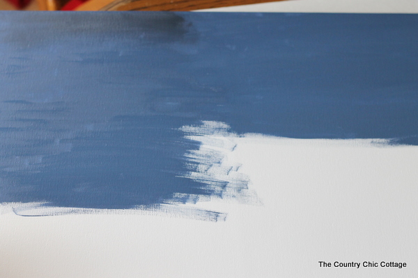 canvas being painted blue