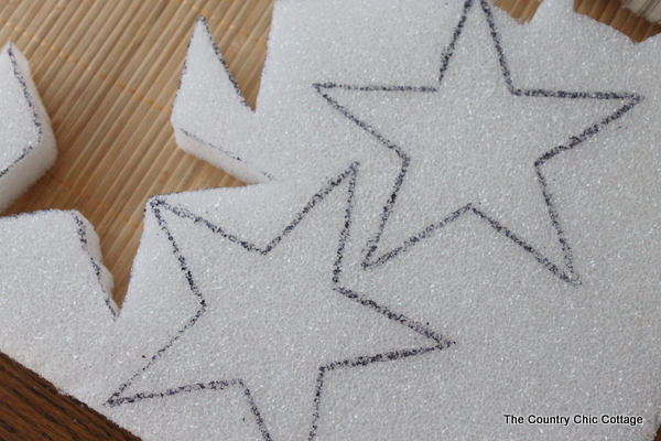 star shapes marked on a piece of foam to cut out 