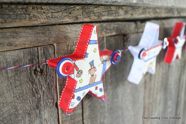 A great buttons and stars garland for your summer or 4th of July decor. Come see how to make this craft with Styrofoam, fabric, and buttons. closeup of star garland