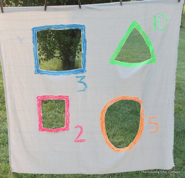 Glow in the Dark Yard Game -- make a summer of fun memories by adding yard games to your backyard or party. This glow in the dark game does not have to stop when the sun goes down! Glow in the Dark Yard Game