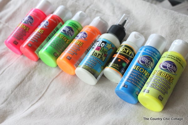 Glow in the Dark Yard Game -- make a summer of fun memories by adding yard games to your backyard or party. This glow in the dark game does not have to stop when the sun goes down! supplies for Glow in the Dark Yard Game
