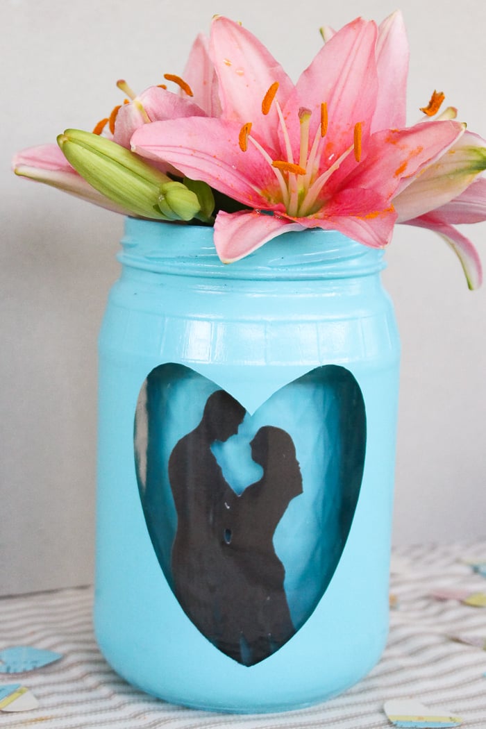 flowers in a painted jar
