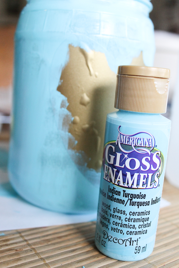 Adding aqua glass paint to a mason jar