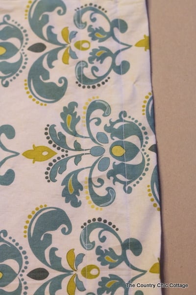 How to Make Curtains: Try this super simple sewing technique. Make an entire curtain with only sewing straight lines. Great tutorial with a video! Two simple straight lines across your curtain fabric to make a full pocket for the curtain rod
