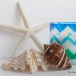 Chevron candle holder with sea shells.