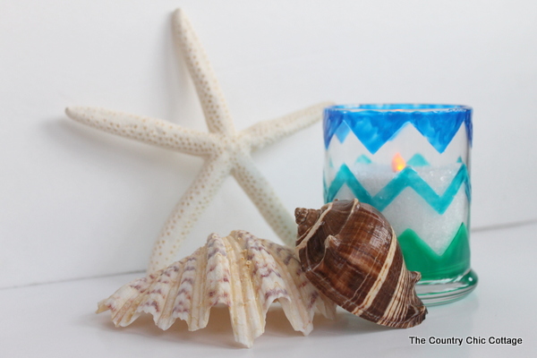 Finished candle with sea shells.