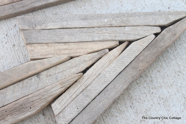 Use reclaimed wood sticks to make this extra large rustic wood arrow for your home today. Use reclaimed wood sticks to make this extra large rustic wood arrow for your home today.
