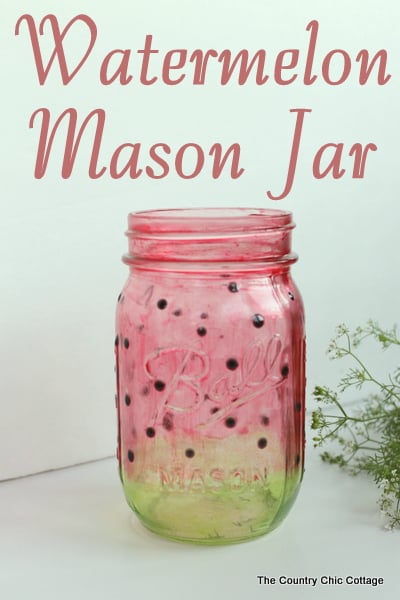 Watermelon Mason Jar -- learn how to paint a great watermelon mason jar craft for summer. Perfect for decorating your home or for parties. The jar turns out see through so you can add candles easily.