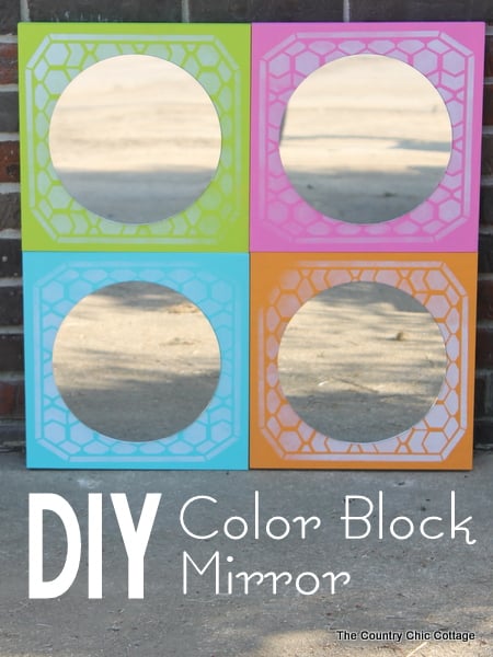 DIY Color Block Mirror -- make this mirrored art for any room in your home easily with a few simple steps. Click to see where to buy the boards, mirrors, paint and stencils to make this great mirror! DIY Color Block Mirror post image