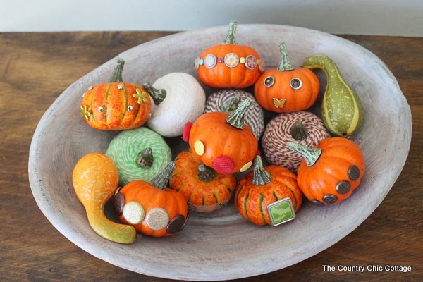 Bradded Pumpkins -- a 5 minute way to update fake or real pumpkins. Just insert brads by pushing! So simple! Click to see a variety of ways to decorate pumpkins with brads.