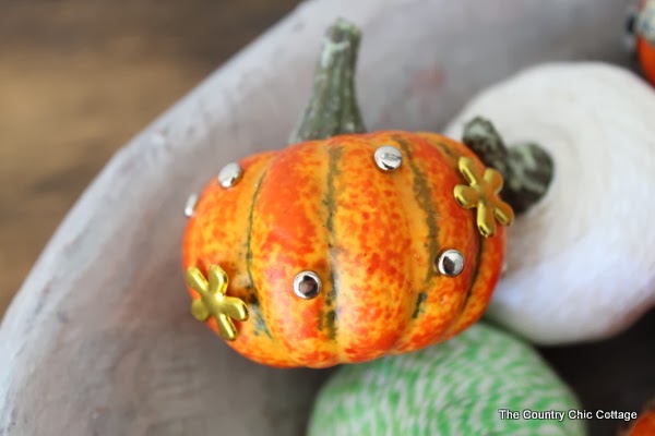 Bradded Pumpkins -- a 5 minute way to update fake or real pumpkins. Just insert brads by pushing! So simple! Click to see a variety of ways to decorate pumpkins with brads.