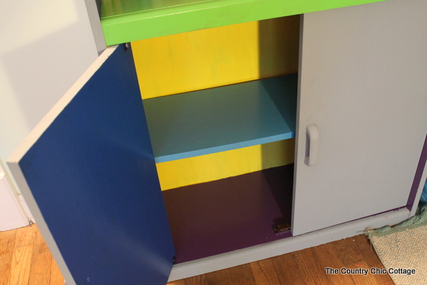 Color Block Book Shelf -- learn how to paint your own book shelf with a color block twist. A colorful addition to any kid or teen room...or change up the colors for any space in your home.