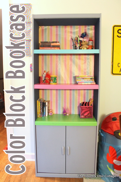 Color Block Book Shelf -- learn how to paint your own book shelf with a color block twist. A colorful addition to any kid or teen room...or change up the colors for any space in your home.