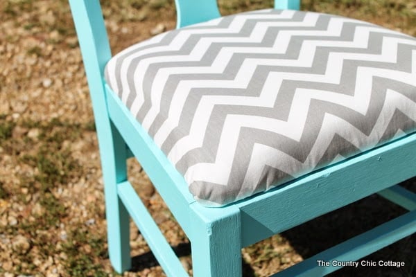 close up of paint and reupholstered cushion