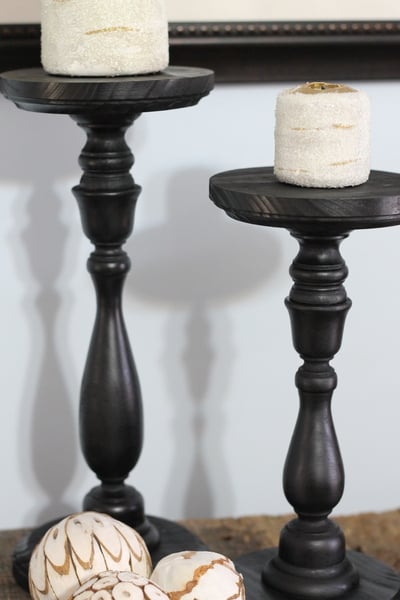 Pottery Barn Knock Off Candle Holders and Candles -- a super simple way to make your own extra tall candle holders from cheap craft store wooden items.