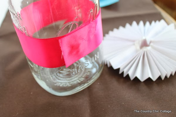 pink ribbon on jar to give as breast cancer gift