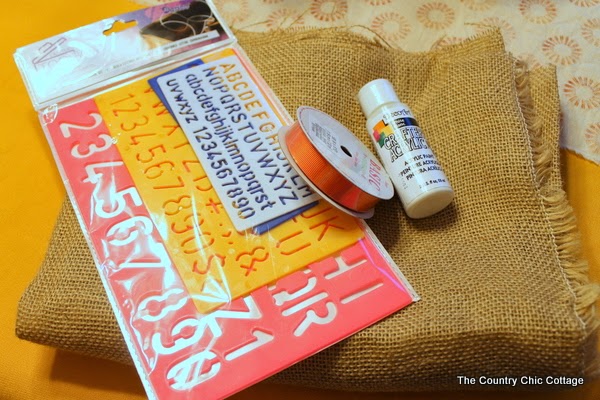 DIY Burlap Thankful Place Mats -- the perfect place mats to make for your Thanksgiving feast. Super simple to make and you can use the word "thankful" or the word of your choice. stencil, ribbon, paint, burlap