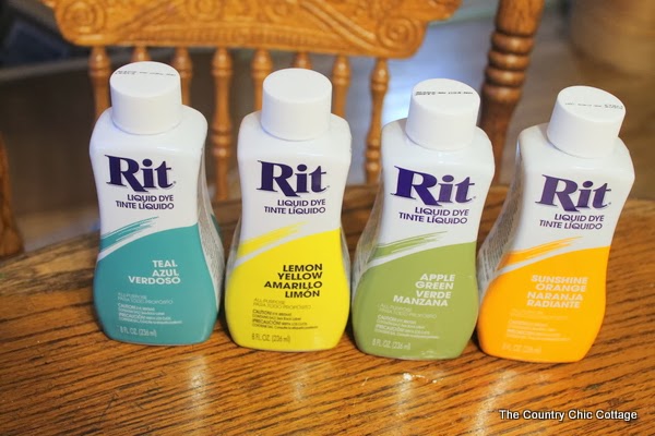 DIY Tie Dye Curtains -- learn how to make your own striped tie dye curtains in any color of the rainbow. I used Rit liquid die to make these DIY tie die curtains--I found this dye worked best!