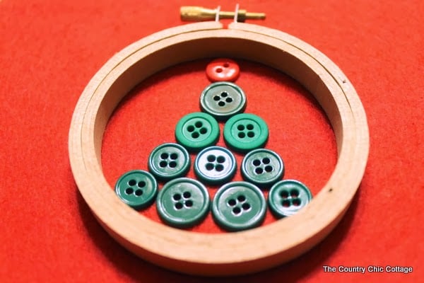 Handmade Gift Idea: 8 hoop ornaments that can be given as gifts this year. Ideas for everyone on your Christmas list. buttons in a hoop ornament